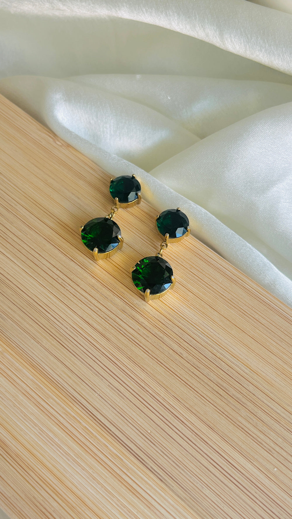 Emerald stone studs