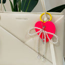 Pearl Bow Heart Charm