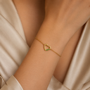 Green four stone heart bracelet