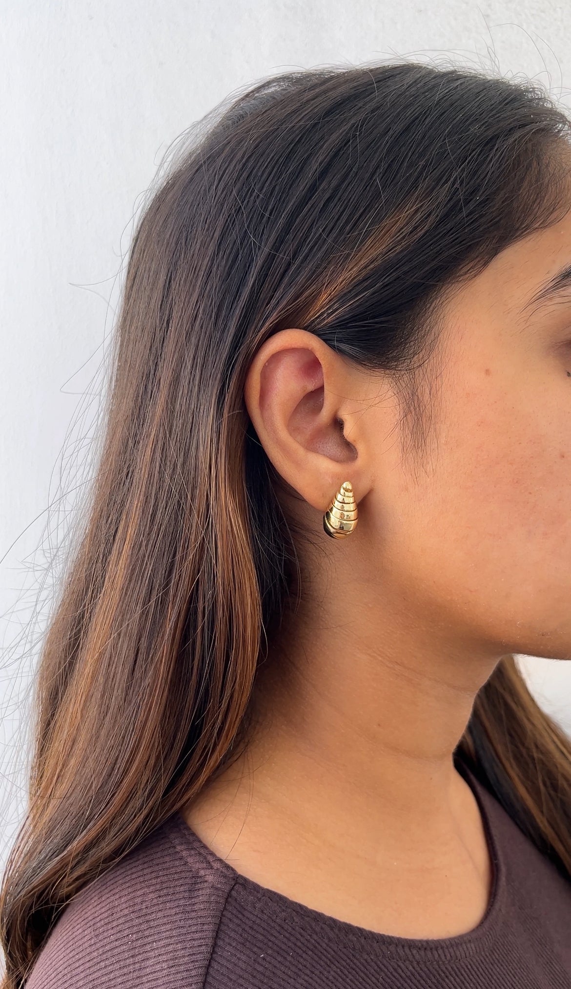 Hadid swirl studs