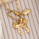 Bow hand charm necklace