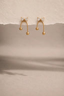 Bow dangling studs