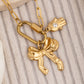 Bow hand charm necklace